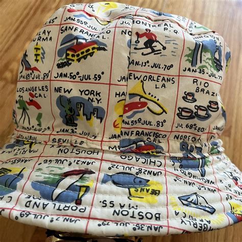 Super cool vintage 1980s bucket hat with travel... - Depop