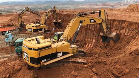 Caterpillar 365C Excavator Loading Trucks And Operator View - YouTube