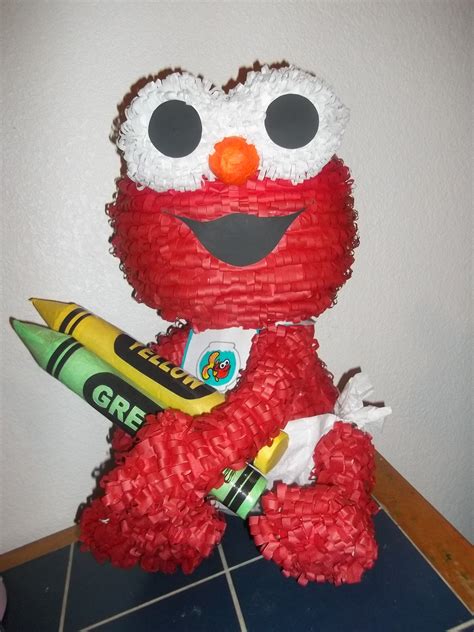 Elmo pinata made with two balloons and tissue paper | Elmo pinata, Elmo ...