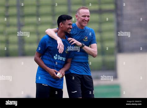 Pace bowling coach Allan Donald (R) along fast bowler Mustafizur Rahman ...