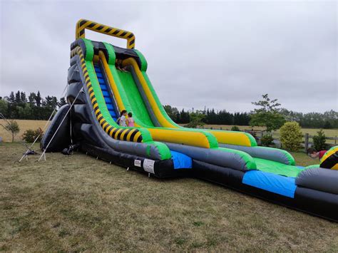 Caution Water Slide | The Bouncy Castle Company