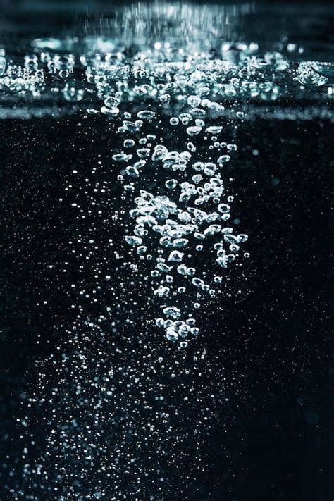 Macro Photography of Bubbles in Water · Free Stock Photo