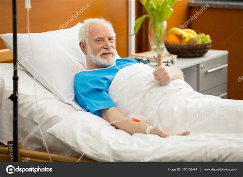 Senior man in hospital bed — Stock Photo © AndreyBezuglov #150152474