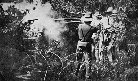 Spanish troops fire a volley into charging Filipino rebels. Philippine revolution, 1896-1898 ...