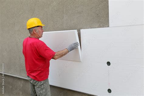 Styrofoam, polystyrene thermal insulation of house wall install Stock ...