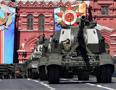 RUSSIA WARNING: Putin flashes military muscle during victory parade ...