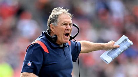 Patriots rookie Brenden Schooler hands ball to a confused Bill ...