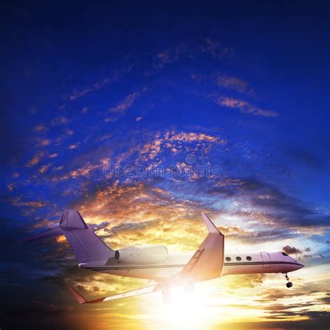 Private jet in sunset sky stock photo. Image of summer - 30658920