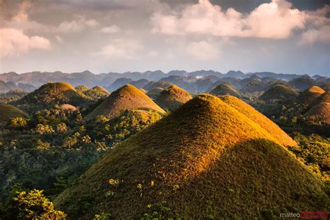 - Dramatic light over Chocolate hills, Bohol, Philippines | Royalty Free Image