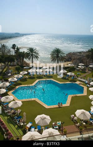 Oman, Muscat, Qurm. Crowne Plaza Hotel from Qurm Beach Stock Photo - Alamy