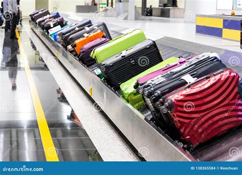 Baggage Luggage on Conveyor Carousel Belt at Airport Arrival Stock Photo - Image of broken ...