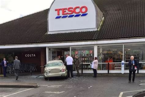 Tesco Sidcup car crash caught on camera as pensioner smashes Jaguar into supermarket in front of ...