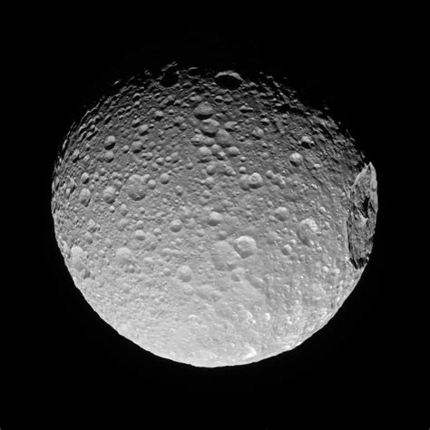 Cassini Spacecraft Views Mimas' Gigantic Crater