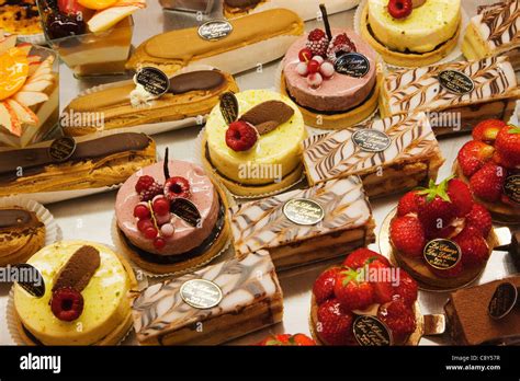 France, Paris, Pastries Display in Patisserie Shop Window Stock Photo ...