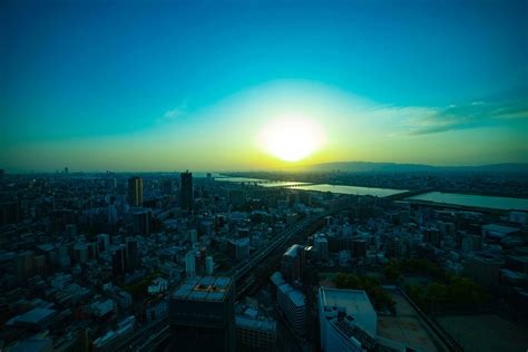 A sunset panoramic cityscape near Yodo river in Osaka wide shot ...