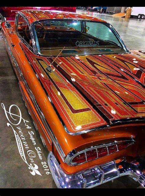 Orange and Red Vintage Car Display