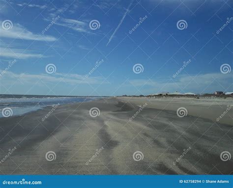 The Beach at Grand Isle, Louisiana Stock Photo - Image of blue, skies: 62758294