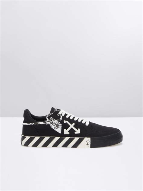 LOW VULCANIZED SNEAKERS in black | Off-White™ Official IE