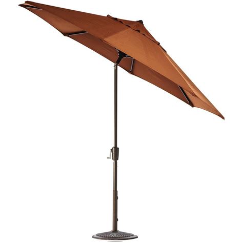 Home Decorators Collection 11 ft. Auto-Tilt Patio Umbrella in Rust Sunbrella with Bronze Frame ...