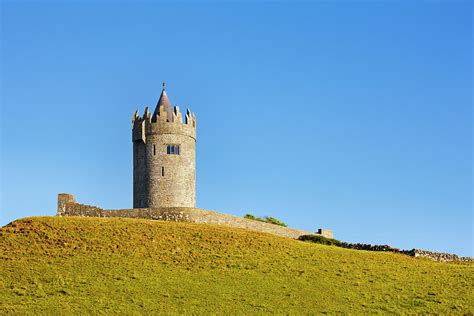 Doonagore Castle Between The Village Of by Lizzie Shepherd / Robertharding