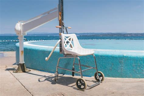 Accessible Beach with Wheelchair Stock Photo - Image of help, assistant: 274549512