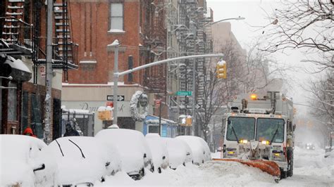 Huge snowstorm blankets US East Coast, halting travel and vaccinations