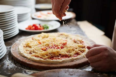 Should Pizza Toppings Go On Top Of Cheese Or Under? - Kitchen Seer