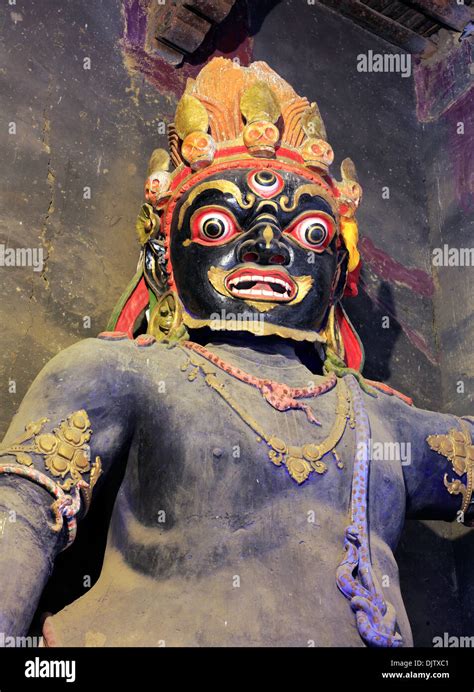 Statue of guardian god, Sakya Monastery, Shigatse Prefecture, Tibet ...