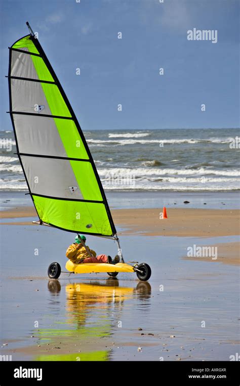 Land sailing on a sand beach Stock Photo - Alamy