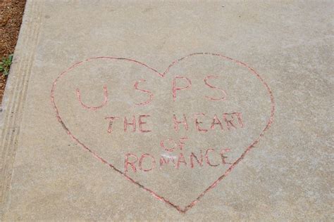 The Heart of Romance - carved into the parking lot at the Romance Arkansas Post Office ...