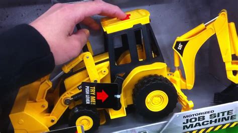 Caterpillar Backhoe Motorized Toy Tractor - YouTube