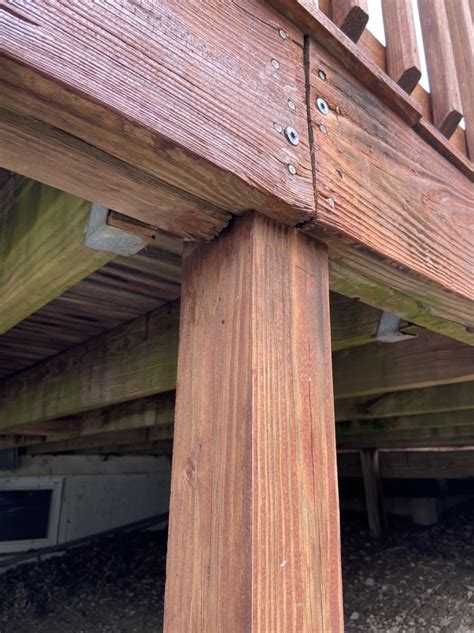 deck - Rim joists sitting on top of notched post - Home Improvement Stack Exchange