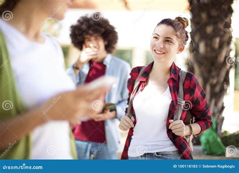 Young students on campus stock image. Image of studying - 100118183