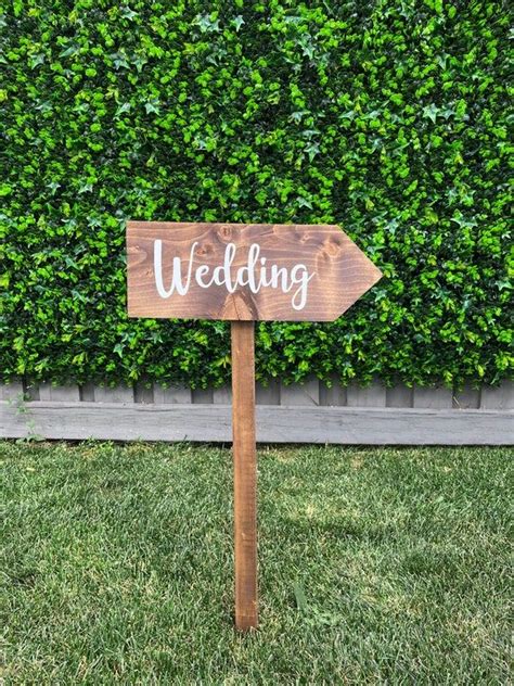 Add a rustic touch to your wedding or event with a rustic wedding arrow sign with white vinyl ...