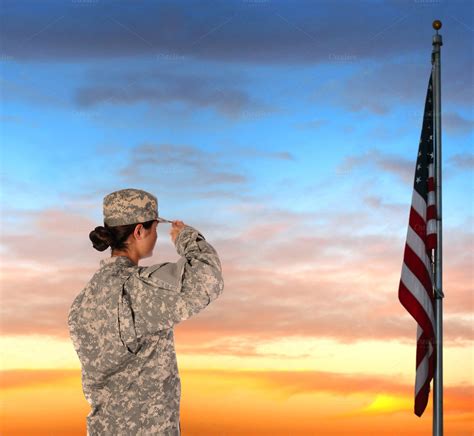 Female Soldier Saluting Flag Sunset ~ People Photos on Creative Market