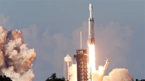 Falcon Heavy, SpaceX’s Giant Rocket, Launches Into Orbit, and Sticks Its Landings - The New York ...