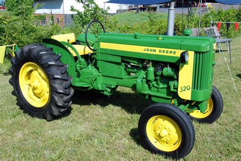 John Deere 320 | Larry | Flickr