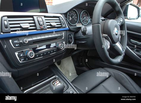 Close up interior detail cockpit of a F30 BMW 3 Series sedan saloon Stock Photo - Alamy