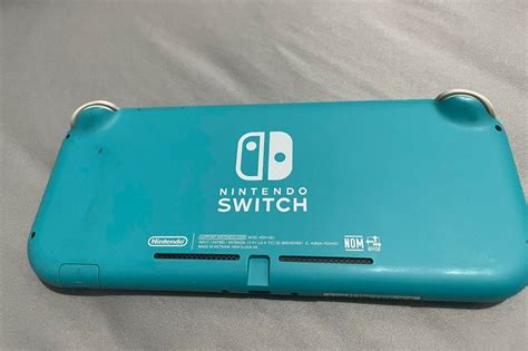 Nintendo Switch Lite (Turquoise) - with 64GB Micro SD and Cases - Lady ...