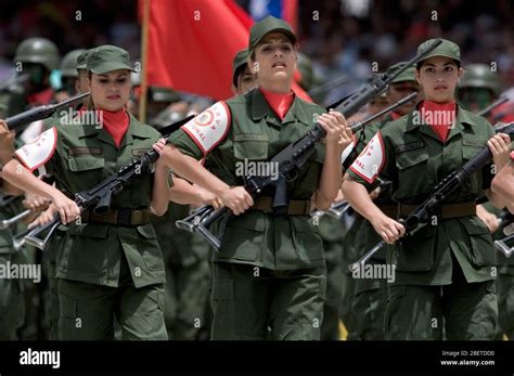 Venezuelan reserve troop female soldiers march during a military parade ...