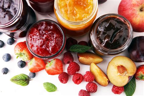 assortment of jams, seasonal berries, plums, mint and fruits - Wild Juniper Farms