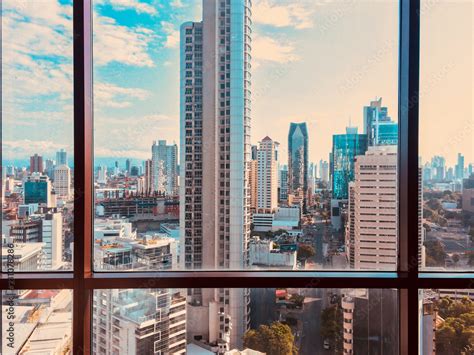 view from skyscraper window on modern city skyline Stock Photo | Adobe Stock