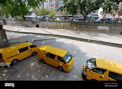 Maintenance vehicles in the Yuen Long Nullah (元朗明渠), a drainage channel in Yuen Long, Hong Kong ...