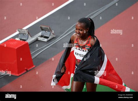 AUG 06, 2021 - Tokyo, Japan: Faith KIPYEGON of Kenya celebrates winning the Gold Medal in the ...