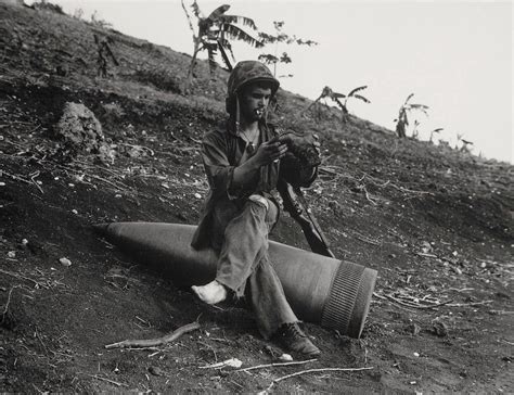 Resting on unexploded 16-inch shell, Saipan, 1944 | Battle of saipan ...