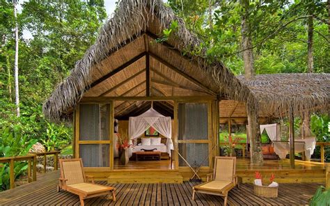 Hotels | Bamboo house design, Hut house, Eco lodges