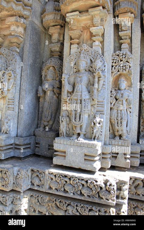 Detailed stone sculptures on the shrine wall of Chennakesava Temple, Hoysala Architecture ...