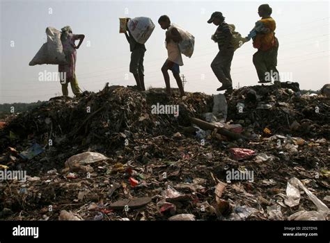 Children working rag pickers in hi-res stock photography and images - Alamy