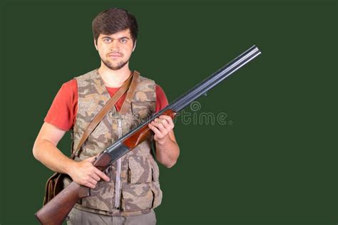 Hunter with his rifle stock photo. Image of meadow, nature - 59359994