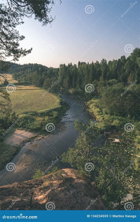 Water Stream in River of Amata in Latvia with Sandstone Cliffs, Green Foliage - Vintage Retro ...